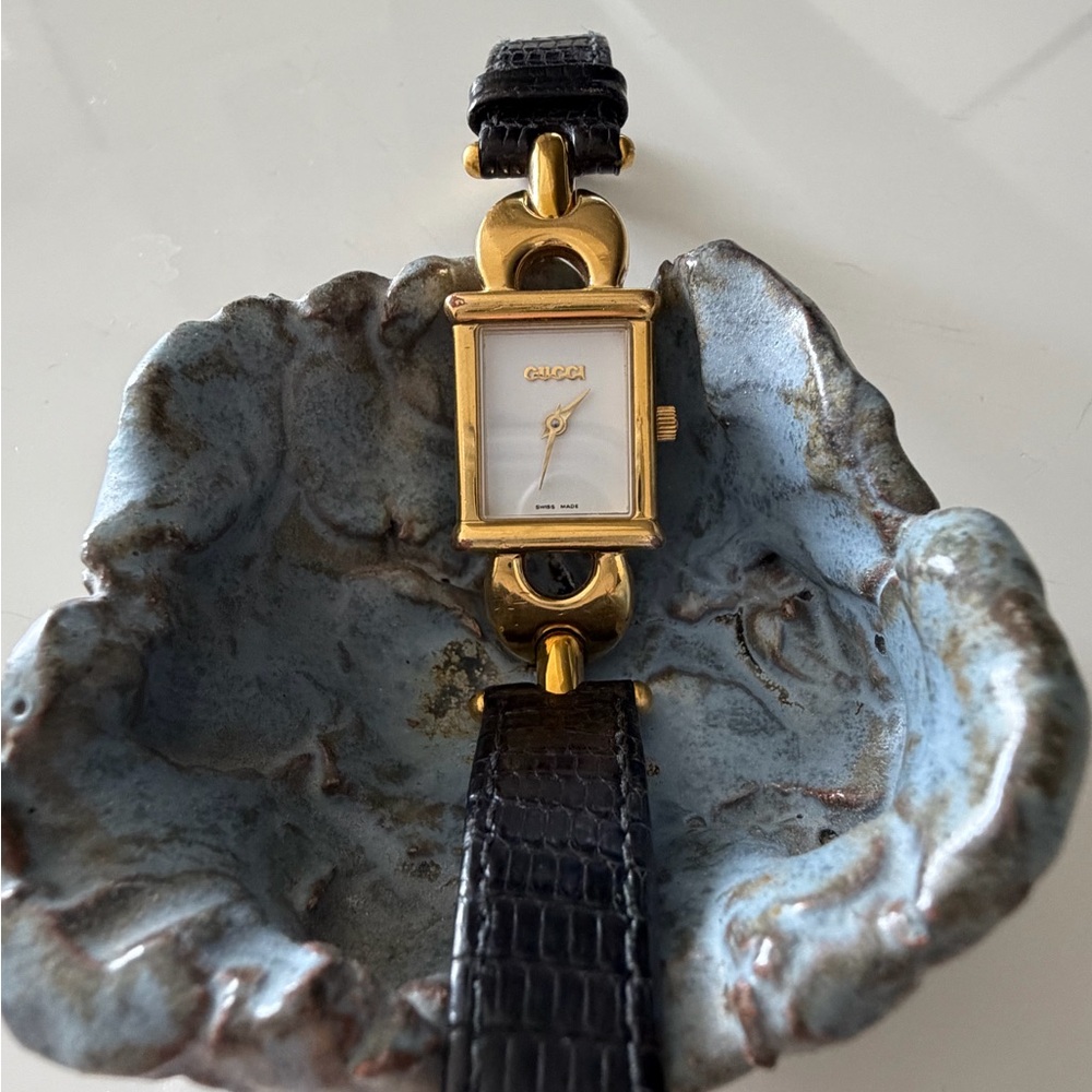 Gucci Gold Tone Rectangular Watch with Black Strap and White Dial